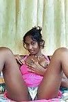 Lovely Indian busty babe Sunita stripping and spreading her legs