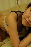 Asian teen Nao Kodaka undressing and spreading her pussy lips