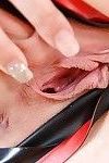 Buxom Euro blonde Victoria Summers masturbating pierced pussy in latex