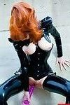 Redhead mistress in latex