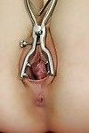 Teen babe Beatrix is using steel vaginal mechanism for spreading