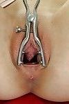 Teen babe Beatrix is using steel vaginal mechanism for spreading