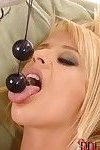 Sexy blonde babe in boots masturbating with help from anal beads