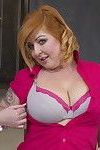 Naughty chubby housewife getting frisky in the kitchen