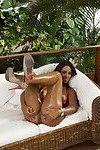 Oiled Brazilian beauty Cris Brasil letting tanned tits free from bikini