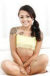 Young Latina slut Holly Hendrix modelling fully clothed in spandex shorts