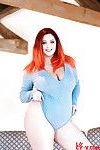 Hot redhead mature fatty Lucy V exposing her massive boobs and big round ass