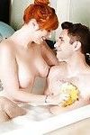 Busty redhead Lauren Phillips sucks Brad Knight\'s big cock in the bath