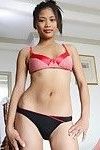 Skinny filipina milf shows off her bits