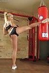 Flexible fitness girl Lea Lexis in shorts toys pussy with dildo at the gym
