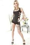 Inked blonde babe Kleio Valentien freeing big tits and ass from dress