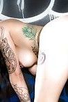 Lovely inked stunner Kelsi Lynn enjoys fingering her bald pussy