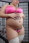Knocked up pornstar georgia peach loves showing off her swollen stomach and big