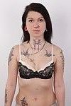 Tattooed brunette in casting session