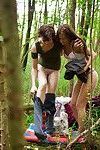 Two lesbians caught naked on spy camera in the woods put clothes back on