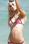 Beach voyeur spies wet blonde babe Uma Jolie and her phat ass in bikini