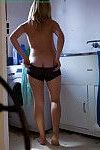 Slutty blonde amateur babe Carel putting on some clothes after cumming