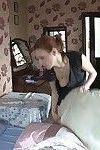 Voyeur shots of girl making her bed bending over showing cleavage downshirt