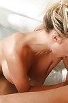 Busty blonde vixen gives an oily handjob and a wet nooky in the bathtube