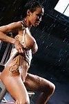 Top-heavy babe Sandee Westgate performs a sizzling wet solo scene