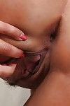 Horny brunette Mega Clit exposing her perfectly formed pink labia