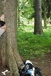 Slutty brunette gets picked up and fucked outdoor by two well-hung guys