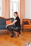 Fully clothed hot redhead Eva bares sexy ass close up wearing high heel boots
