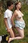 Redhead girl with hot tits shows naked upskirt & gives handjob outdoors
