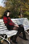 Brunette glamour model Malena in boots posing non nude outdoors