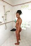 Black babe London Banks showing off big booty in kitchen before showering
