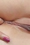 Brunette schoolgirl Avril spreading her ass and pussy lips