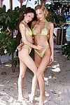 Amateur lesbians in bikinis stripping and kissing each other outdoor