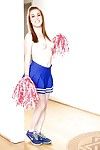 Cute redhead cheerleader Jessie Parker happily spreading her tight ass