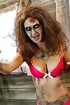 Saucy brunette cosplayer Kleio unveils her zombie tits and pussy