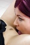 Amateur lesbians Cora Kitty and Lolita licking pussy before strapon fucking