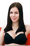 Dark haired Karolina Young in stockings showing nice tits & bald twat closeup