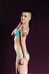 Tattooed pornstar Rachael Madori posing nude after ditching lingerie